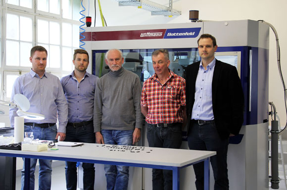 Mikrotechnik and Wittman transform 5-axis micro MIM machine into six-axis-controlled production cell