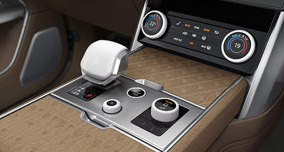 The gear shifter, volume control dial and terrain response dial are all produced using Ceramic Injection Mouding, offering a cool-to-the-touch, scratch-resistant luxury finish (Courtesy Jaguar Land Rover)