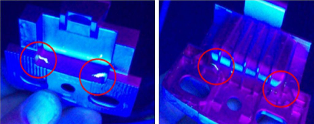 Fig. 4 Penetrant tests identified porosity areas in the first iteration of the part due to demixing and sintering deformation
