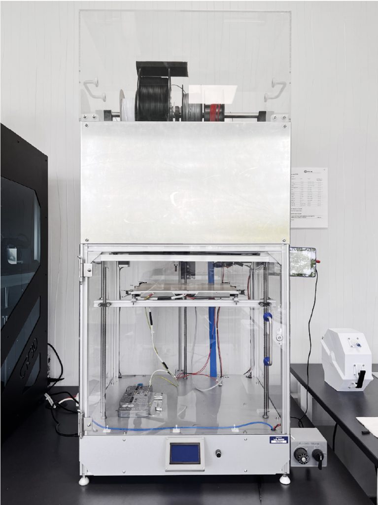 Fig. 2 The Sparkcube polymer printer, a generic CoreXY DIY kit from Sparklabs, was used for initial trials of metal filament (Courtesy Sascha Lenze)