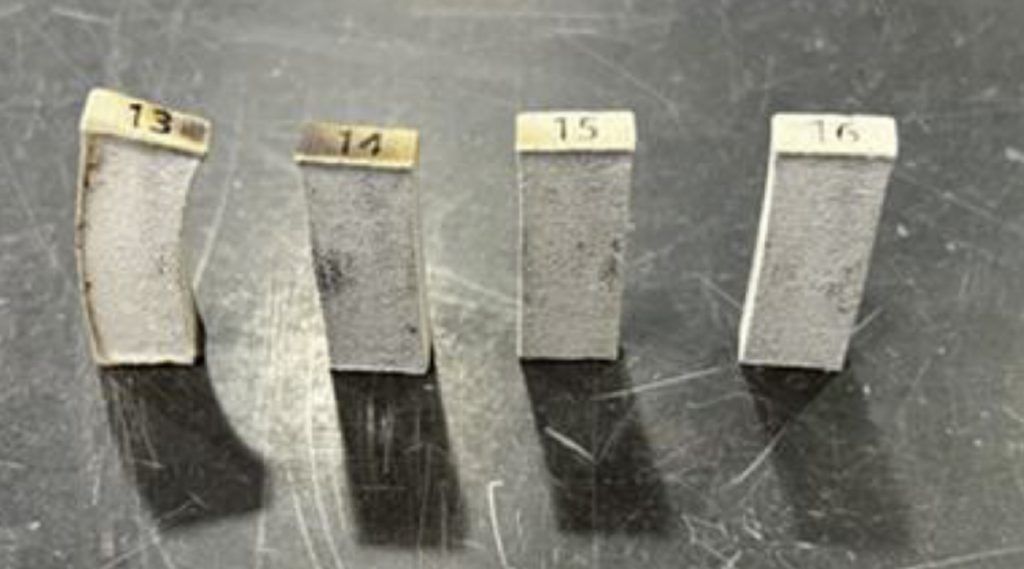 Fig. 3 Four aluminium samples sintered in the same cycle. Nitrogen gas flow was from left to right [1]