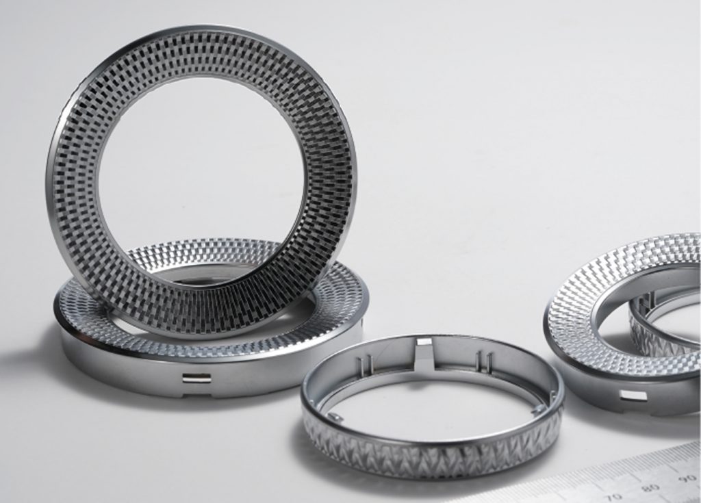 Fig. 1 A 316L stainless steel rotary wheel used in an automotive interior (Courtesy MPIF)