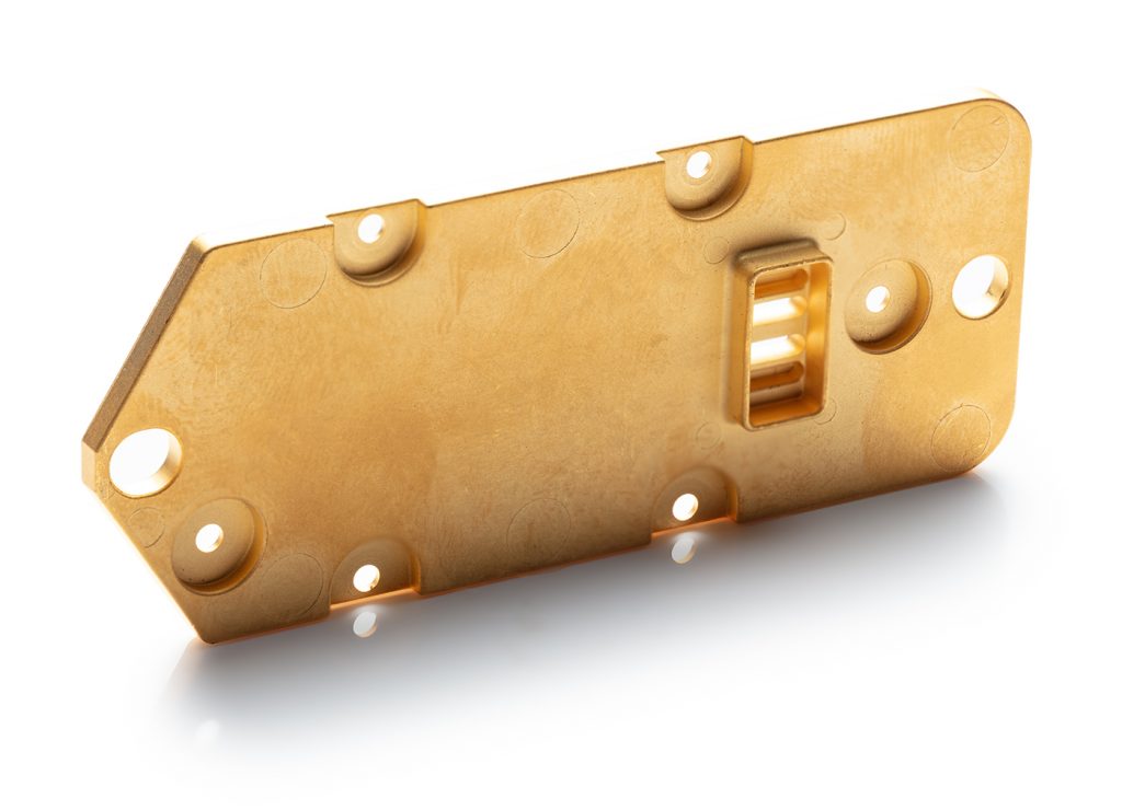 Fig. 9 Part of an anti-collision radar system used in automotive. The material is nickel iron, which is then gold plated (Courtesy CMG Technologies)