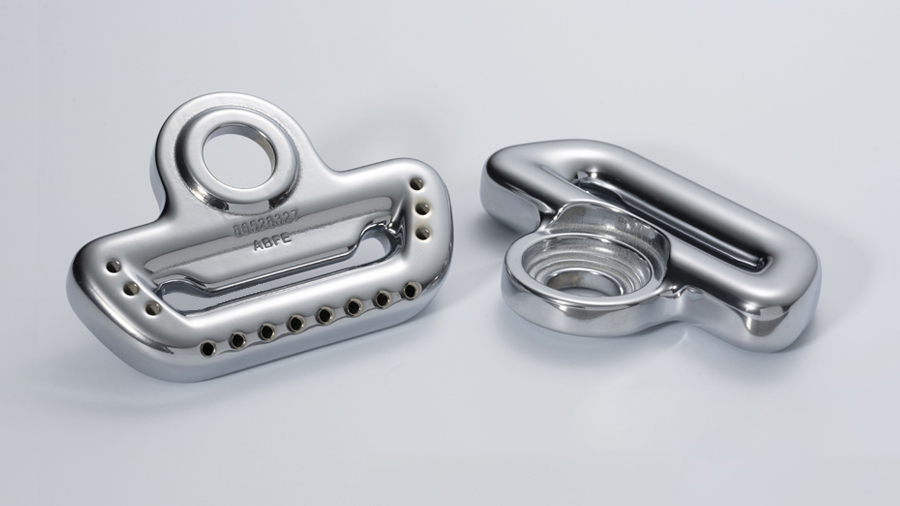 Fig. 9 Azoth won an award for a seatbelt pillar adjustable guide loop for its customer, General Motors. The part is used in the all-electric Cadillac Celestiq (Courtesy MPIF)