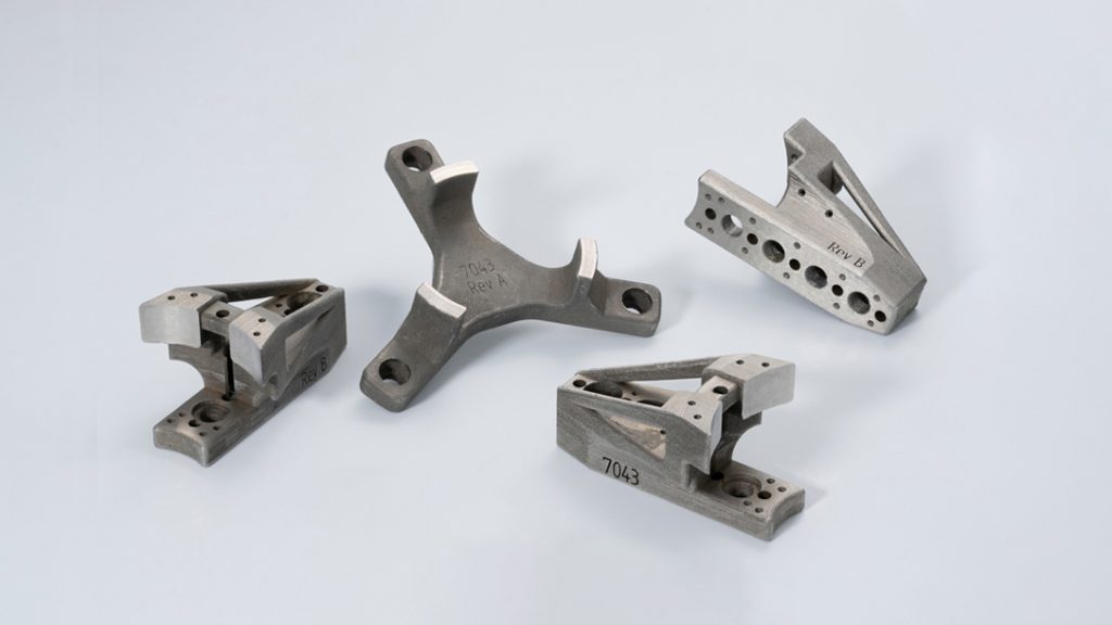 Fig. 15 APG-MIM, a division of Nichols Portland Inc, won an award for these 150 mm pneumatic chuck jaws for work-holding during precision turning. The parts are made by a sinter-based AM process, called Moldjet, developed by Tritone Technologies (Courtesy MPIF)