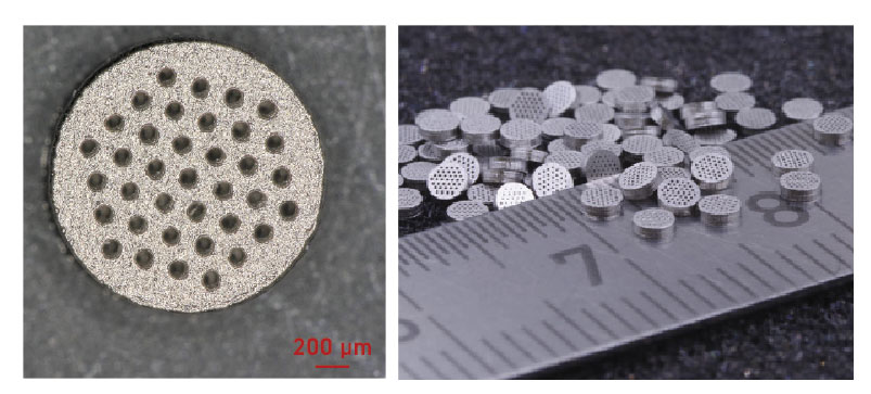 Fig. 30 An in-line diesel fuel filter made from 316L stainless steel. The part diameter is 2 mm, the thickness is 600 μm, the hole diameter is 120 μm, and the wall thickness is 100 μm (Courtesy Exentis) 