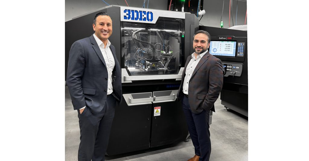 Fig. 5 Matt Petros and Payman Torabi with one of the company’s third generation Saffron AM machines (Courtesy 3DEO)