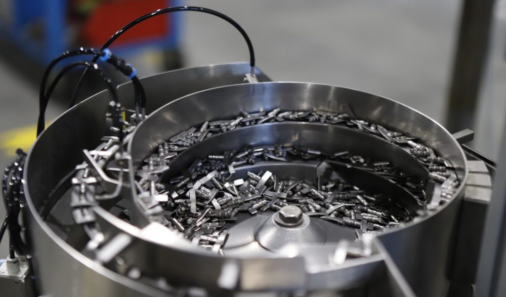 Fig. 8 The automated sorting of automotive turbocharger vanes (Courtesy AFT-Hungary)