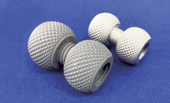 The CeraFila SUS316L stainless steel filament from Dai-ichi Ceramo is now available on the UltiMaker Marketplace. Seen here is a stainless steel bolt and nut before (left) and after sintering (Courtesy Dai-ichi Ceramo)