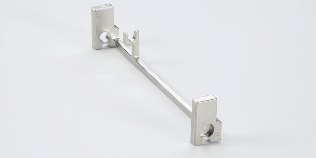 Fig. 18 This ‘keeper release’ from a door lock received an MPIF MIM Hand Tools/Recreation Grand Prize (Courtesy MPIF)