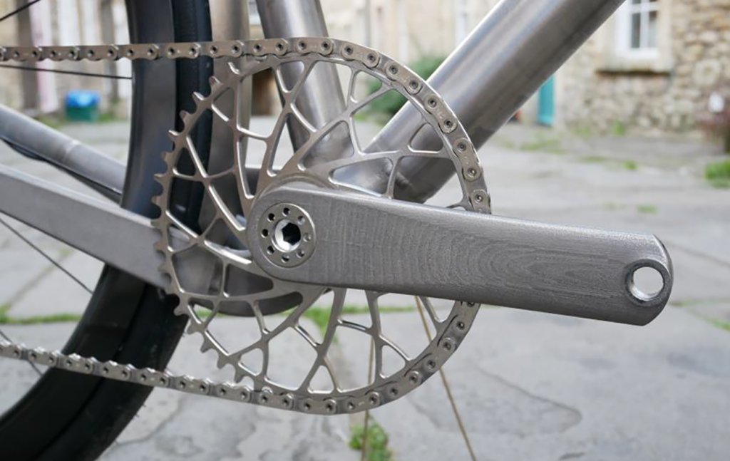 Fig. 10 An additively manufactured chain wheel and pedal crank for a bicycle (Courtesy Sturdy Cycles)