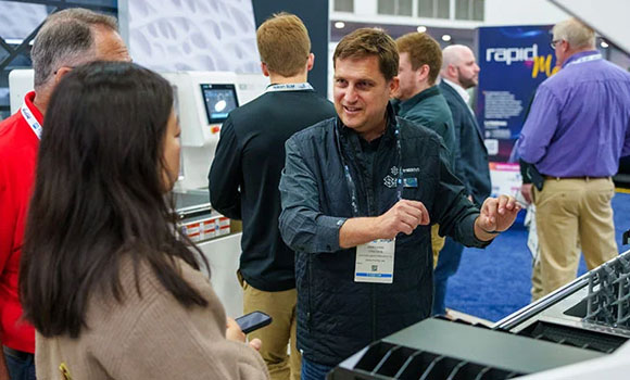 Register with code AMERICAMAKES to claim a free Expo Pass and save 40% on a Full Conference Pass (Courtesy RAPID + TCT 2026)