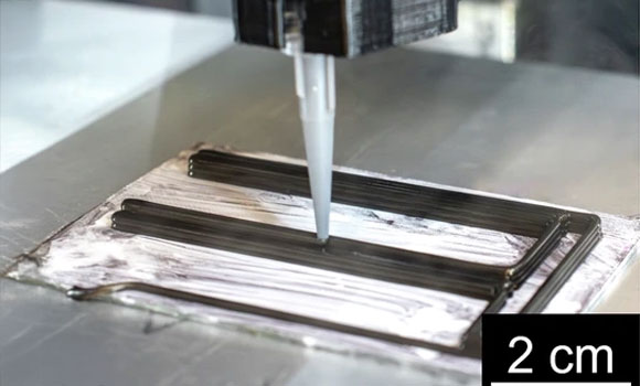 The Additive Manufacturing of a pair of bend bars, connected via a waste line (Courtesy Jonathan Kaufman et al, Air Force Research Laboratory/npj Advanced Manufacturing)