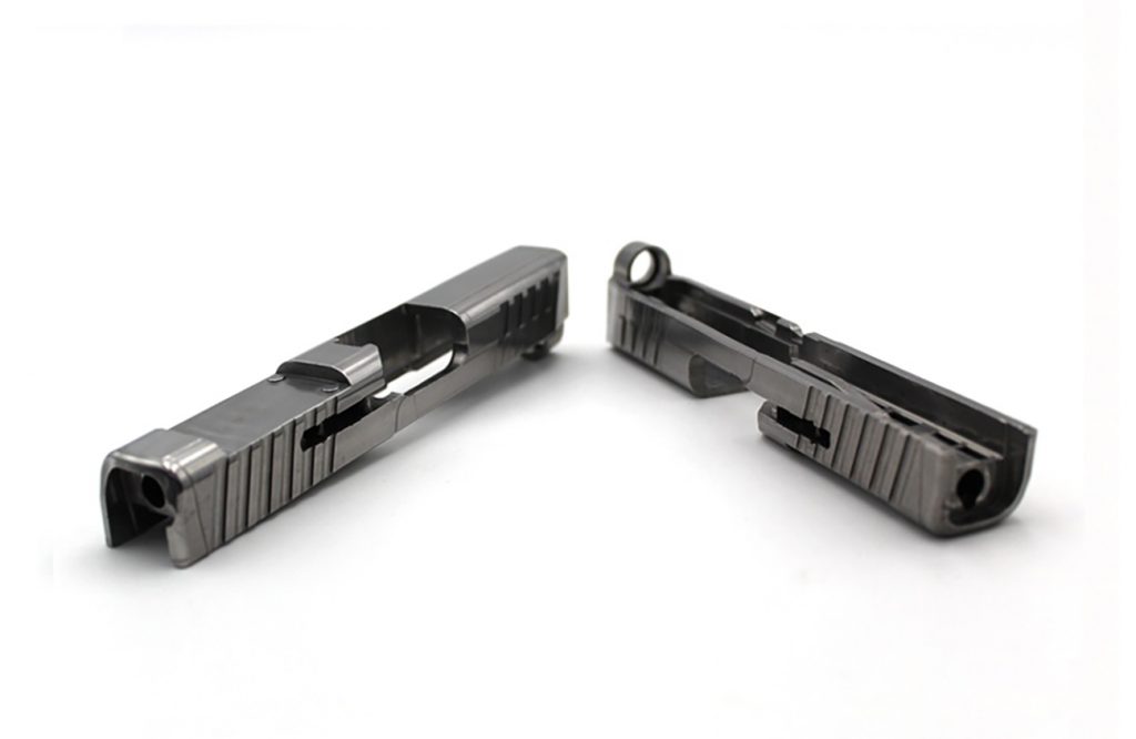 Fig. 3 ARC Group Worldwide: pistol slide enabling hammer reset in semi-automatic firearm (Courtesy MPIF)