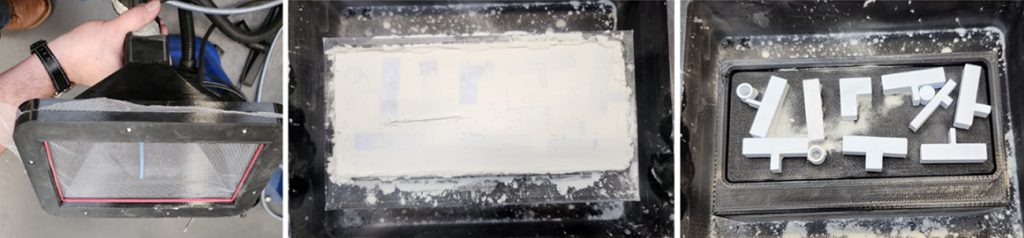 Fig. 4 Depowdering process using the extraction hood (Courtesy IPH)