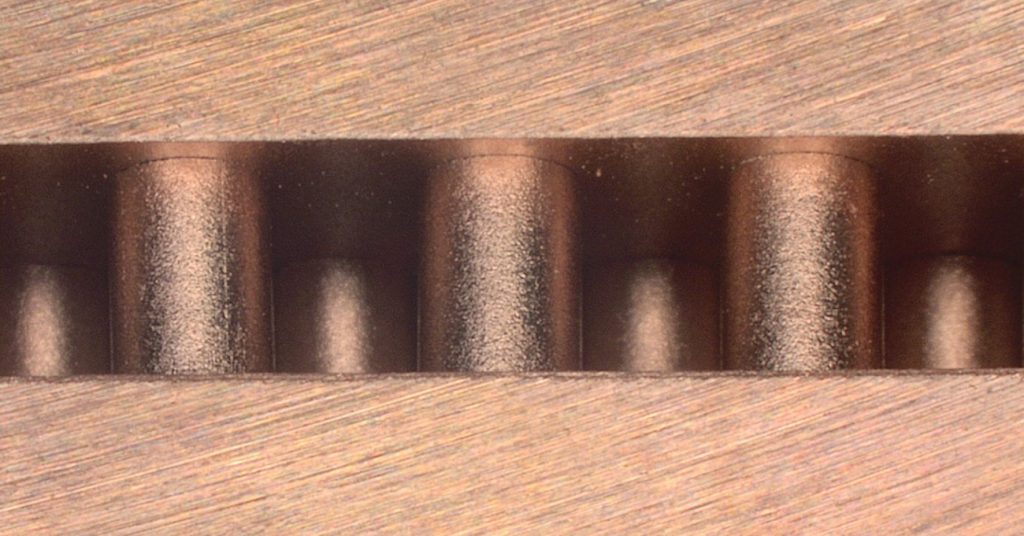Fig. 6 Cross-section showing sinter-joined pin structures without brazing