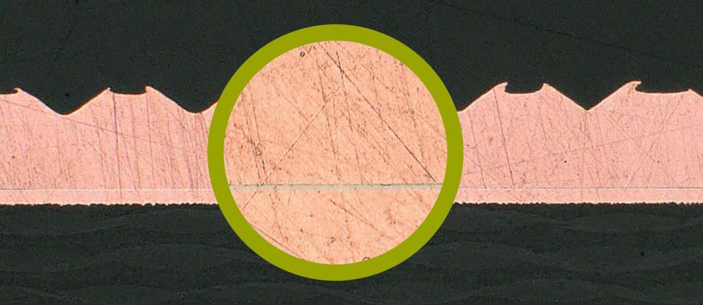 Fig. 9 Cross-section of an ultrasonic welding connection: 0.8 mm Cu terminal and a 35 µm Cu/ENIG PCB surface