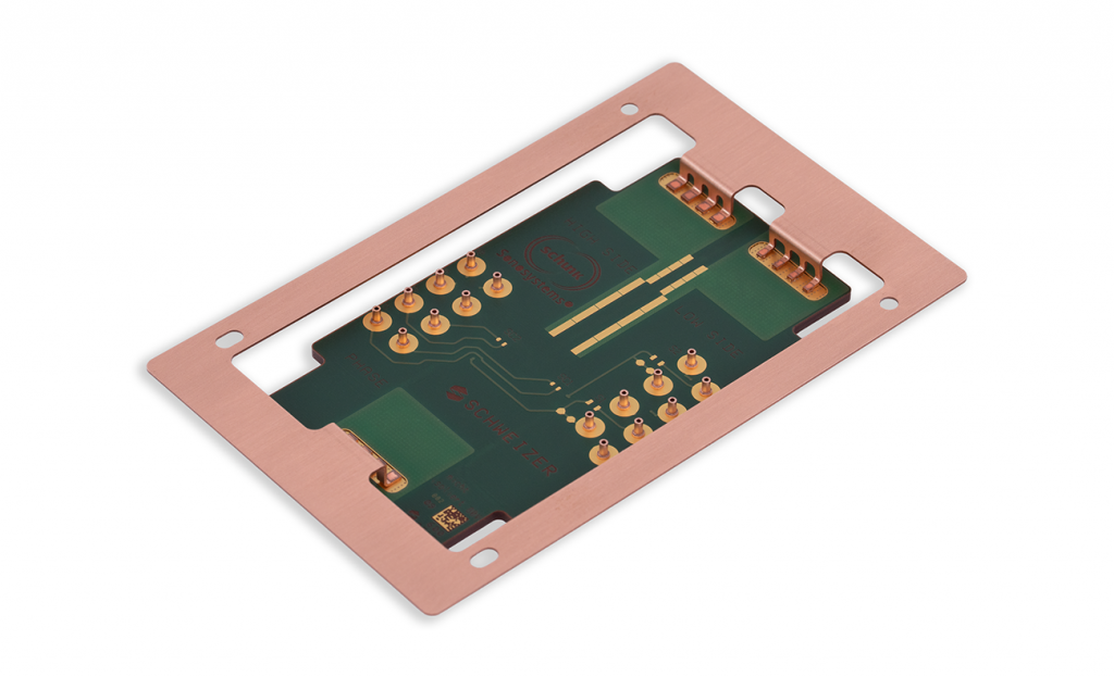 Fig. 10 Demonstrator assembly showing the PCB integrated within a copper frame
