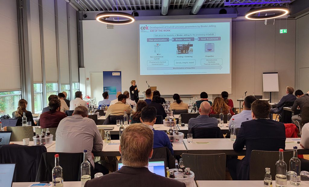 Fig. 11 Shandra Sainz Rodriguez, CEIT, presented ongoing work to establish robust Binder Jetting parameters for CuCrZr (Courtesy Fraunhofer IFAM)