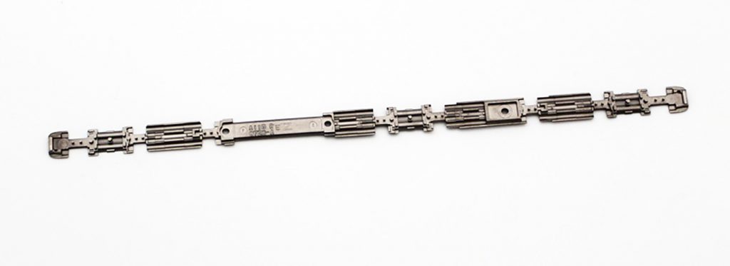 Fig. 13 Hangzhou Sino-MIM: MIM stainless steel hinge plate for foldable mobile phones (Courtesy MPIF)
