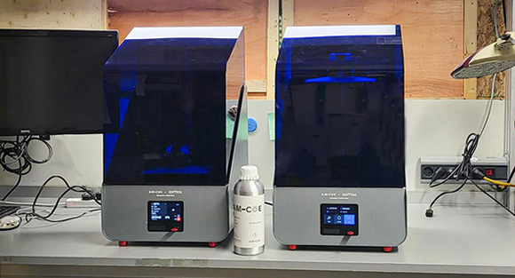 Two ceramic resin Additive Manufacturing machines under testing at AM-COE (Courtesy Zortrax)