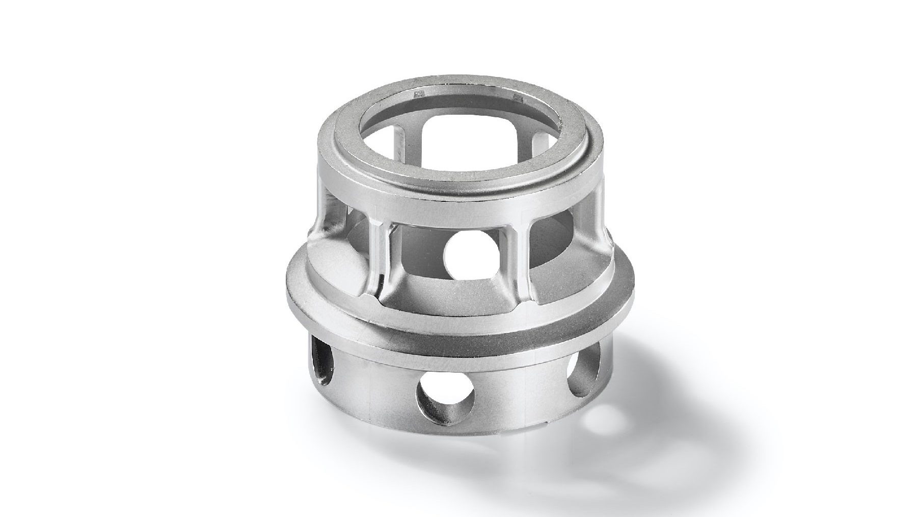 Fig. 4 This adjustment insert enlarges or tapers the intake port of a turbocharger. The diameter is 60 mm, the maximum wall thickness is 7 mm, and the part weighs 184 g (Courtesy Schunk)