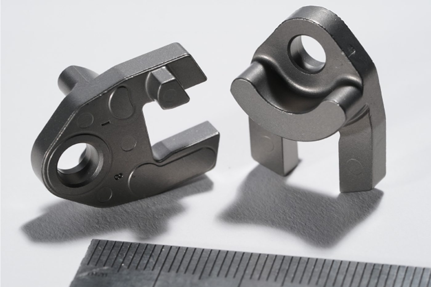 Fig. 7 Vane levers used as gas flow controllers in the turbochargers of internal combustion engines (Courtesy MPIF)