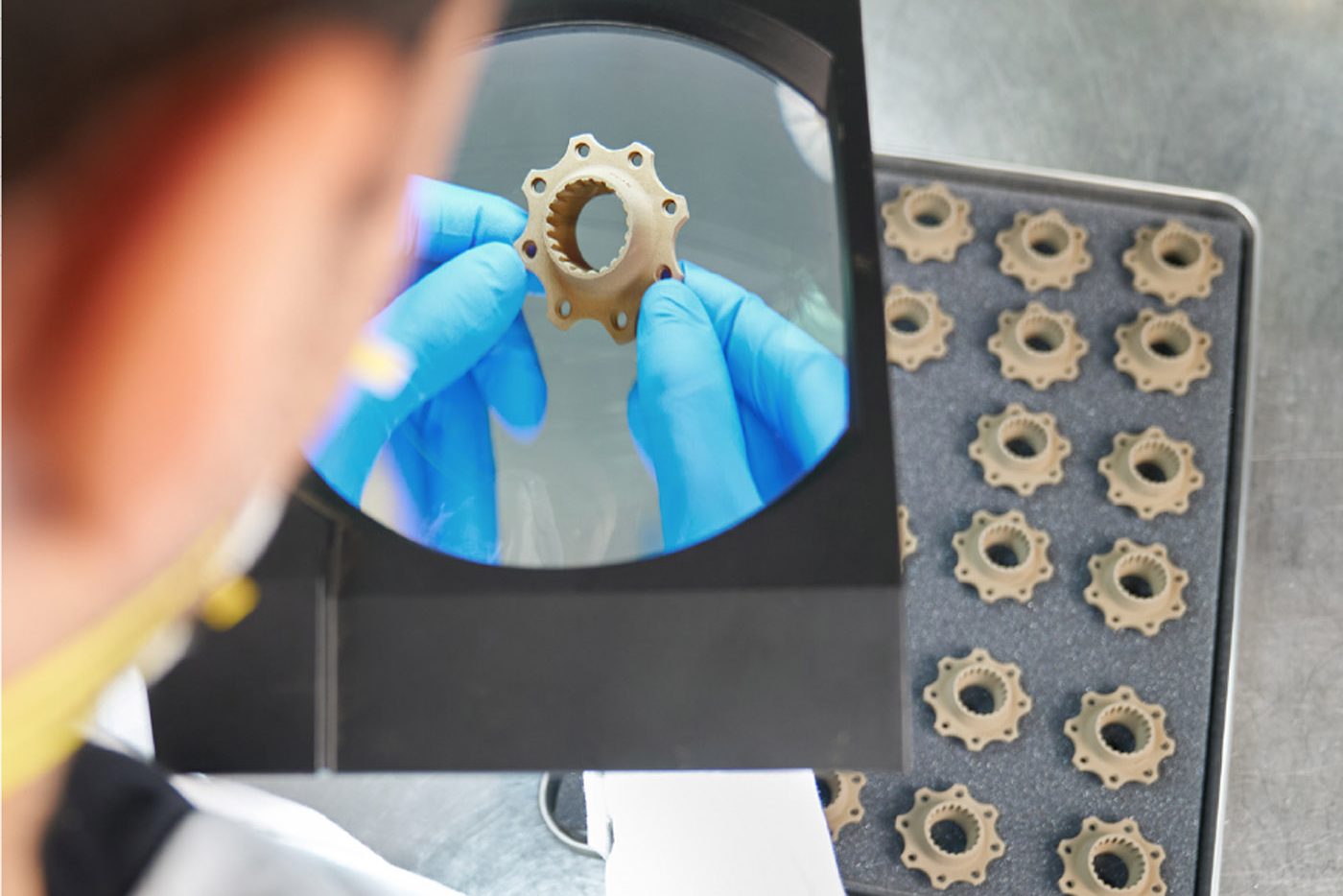 Fig. 10 HP Metal Jet green parts during close-up inspection