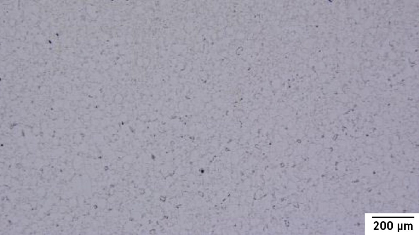 Fig. 4 Cross-sectional microstructure of a sintered part, unetched [1]