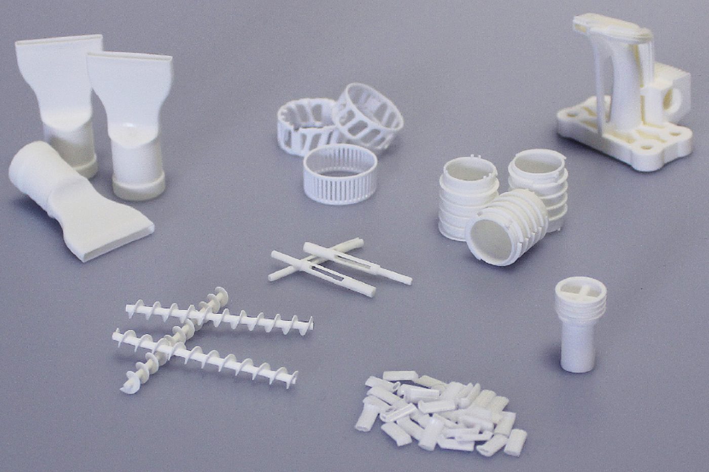 Fig. 7 The tubes featured in this article, together with other ceramic parts, additively manufactured in series by Steinbach (Courtesy Steinbach AG)