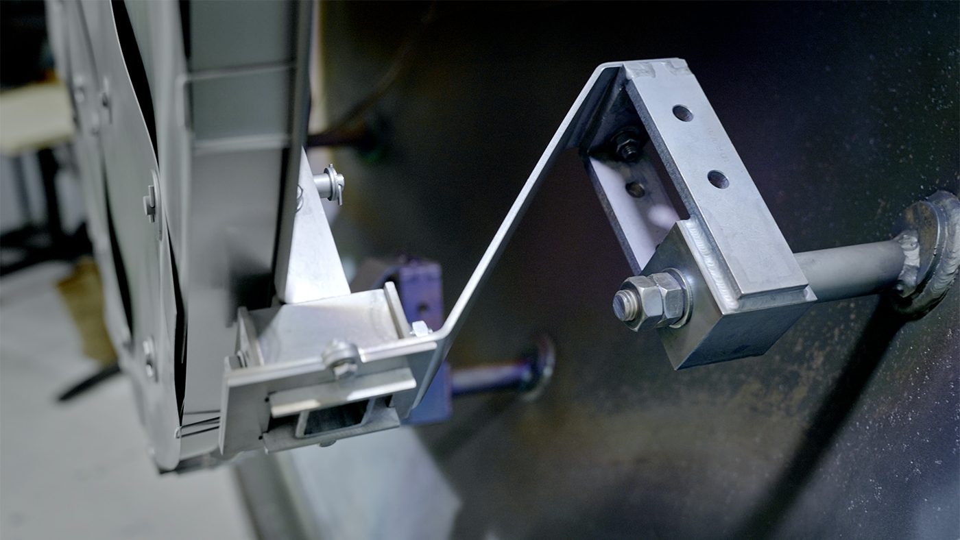 Fig. 7 Patented flexible fixture of the front door with automatic gap control (Courtesy Plansee SE)