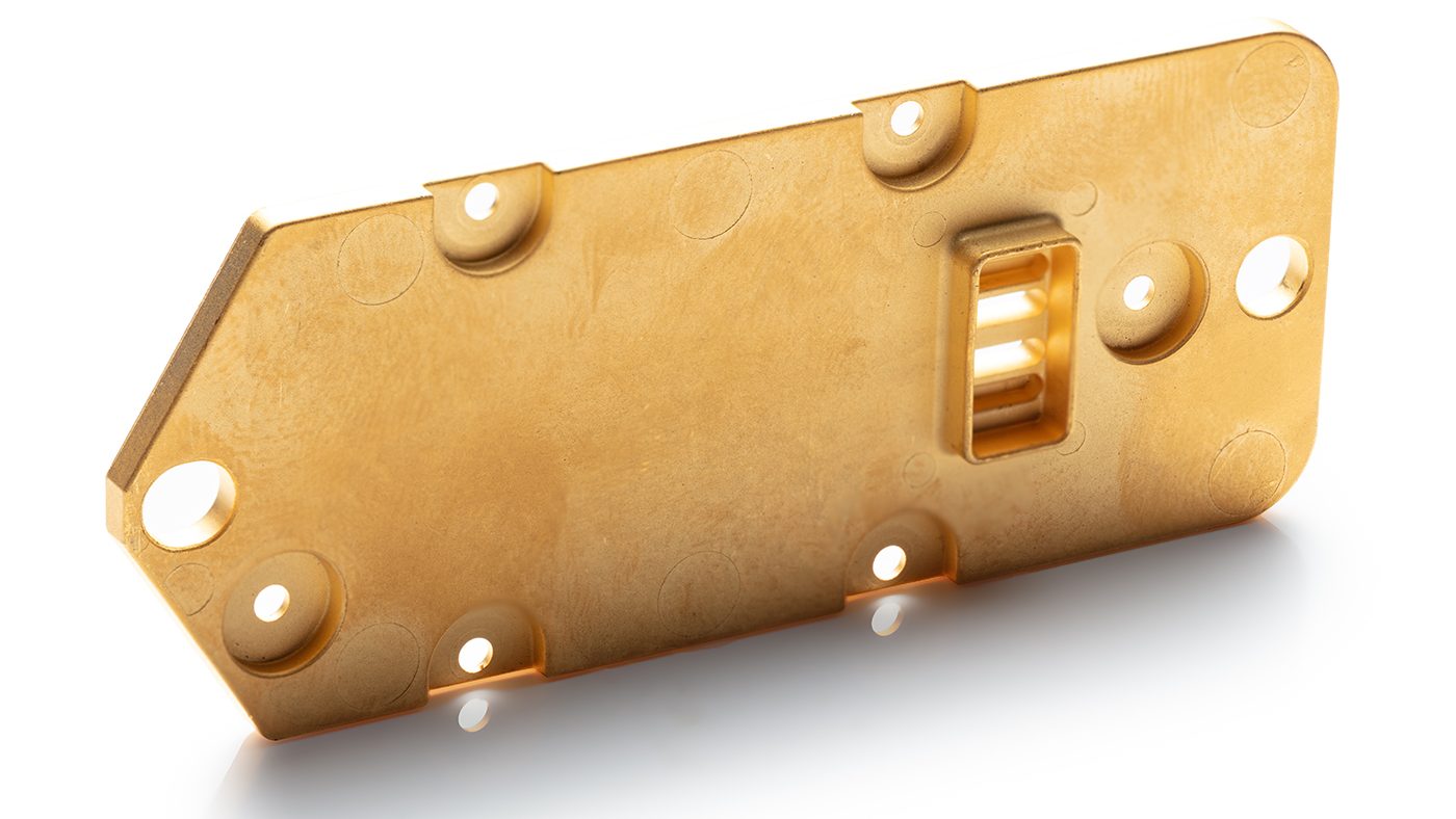 Fig. 9 Part of an anti-collision radar system used in automotive. The material is nickel iron, which is then gold plated (Courtesy CMG Technologies)